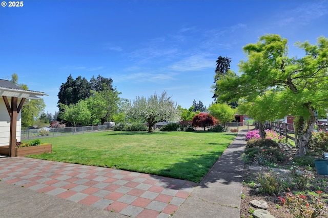view of yard featuring fence