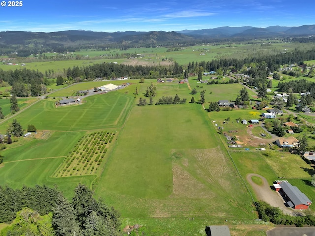 bird's eye view with a rural view and a mountain view