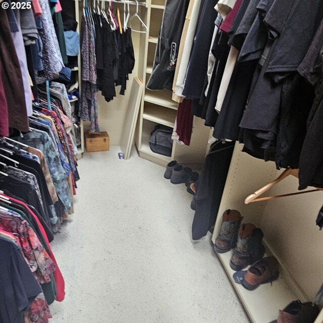 washroom with washing machine and dryer and cabinets