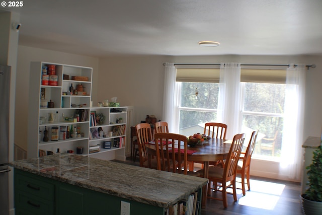 dining room with dark wood finished floors