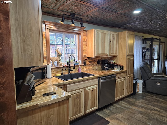 kitchen featuring dishwasher, dark hardwood / wood-style floors, sink, and light brown cabinets