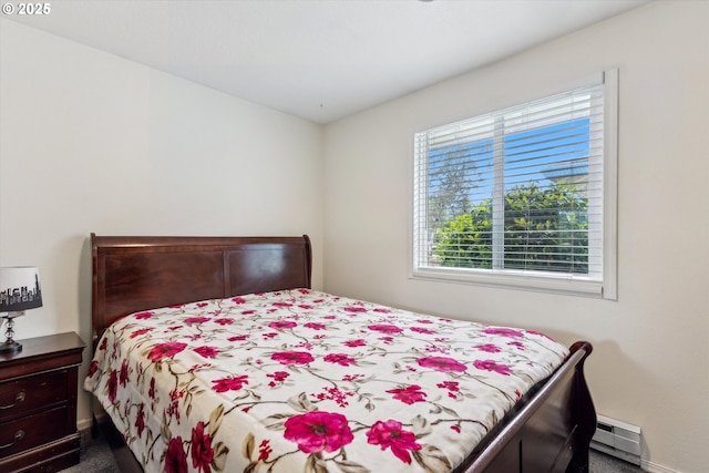 18366 SW Jann Dr, Beaverton, OR 97003 - bedroom with a baseboard radiator, dark colored carpet, and baseboards