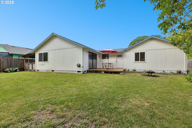 18366 SW Jann Dr, Beaverton, OR 97003 - rear view of property with a deck and an outdoor fire pit