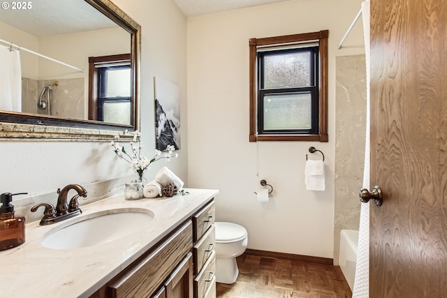 9080 NW Sherry Ct, Portland, OR 97229 - full bathroom with a shower with shower curtain, toilet, vanity, and baseboards