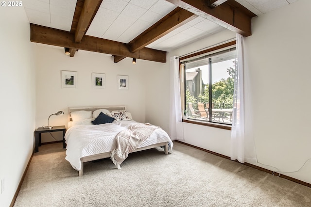9080 NW Sherry Ct, Portland, OR 97229 - bedroom with carpet, beam ceiling, and baseboards