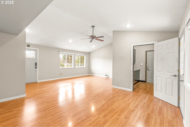 unfurnished living room featuring ceiling fan, baseboards, light wood-type flooring, and lofted ceiling