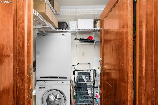 2083 NW Johnson St Unit 66, Portland, OR 97209 - washroom featuring estacked washer and dryer and water heater