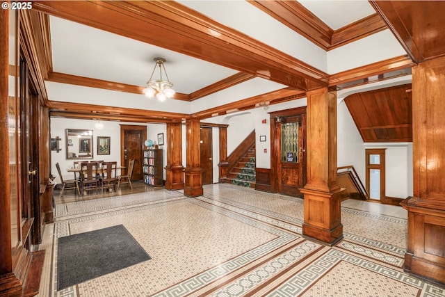 2083 NW Johnson St Unit 66, Portland, OR 97209 - building lobby featuring ornamental molding, stairway, and wainscoting