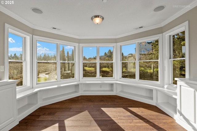 unfurnished sunroom with visible vents