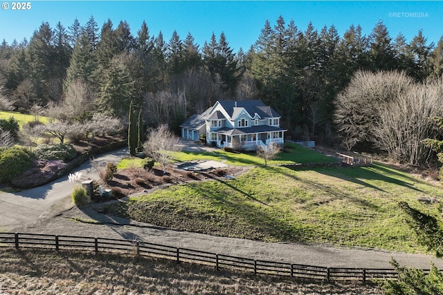 bird's eye view featuring a forest view