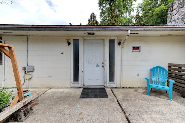 29882 S Hult Rd, Colton, OR 97017 - property entrance with concrete block siding and a patio area