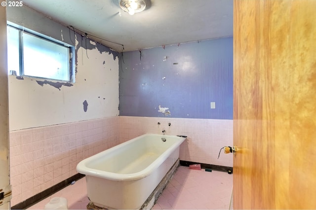 29882 S Hult Rd, Colton, OR 97017 - full bath featuring tile walls, a freestanding tub, and a wainscoted wall