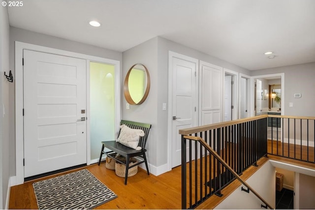 10701 SE Stevens Way, Happy Valley, OR 97086 - foyer with light wood-type flooring, recessed lighting, and baseboards