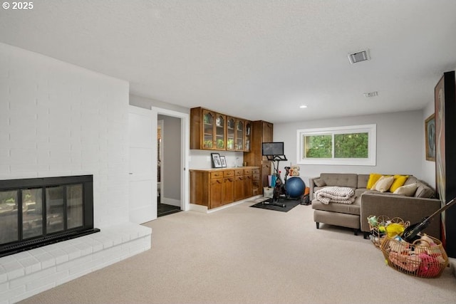 10701 SE Stevens Way, Happy Valley, OR 97086 - workout room with carpet and a brick fireplace