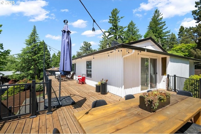 10701 SE Stevens Way, Happy Valley, OR 97086 - wooden deck featuring outdoor dining space