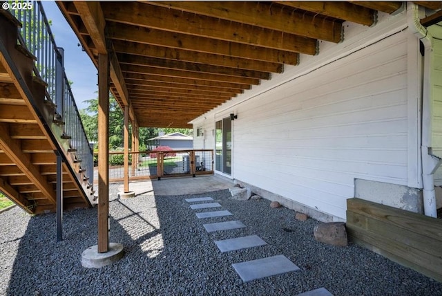 10701 SE Stevens Way, Happy Valley, OR 97086 - view of patio / terrace with stairway