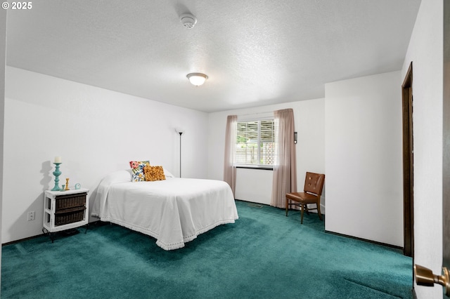 1911 SW Vista Pl, Pendleton, OR 97801 - bedroom featuring carpet flooring and a textured ceiling