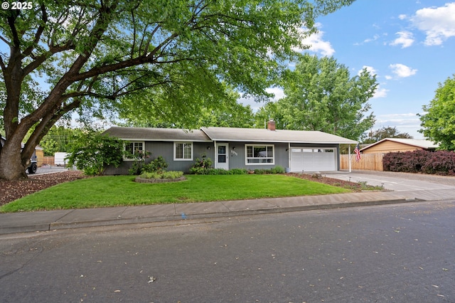 1911 SW Vista Pl, Pendleton, OR 97801 - ranch-style house with an attached garage, driveway, and a chimney