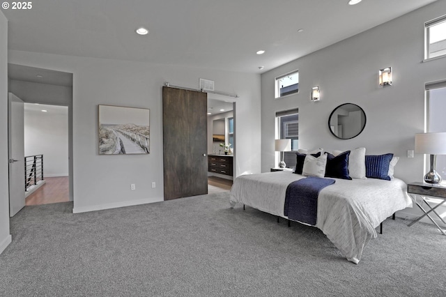 carpeted bedroom with recessed lighting, multiple windows, and baseboards