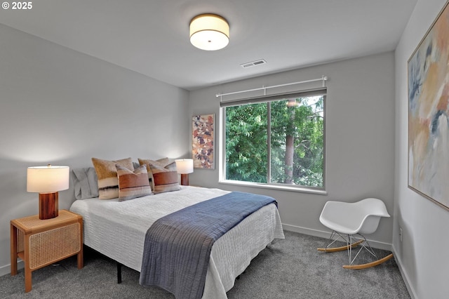 carpeted bedroom with baseboards