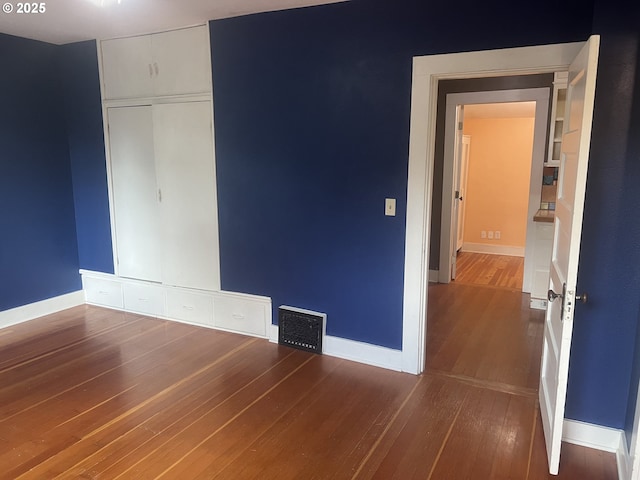 6433 NE 35th Ave, Portland, OR 97211 - unfurnished bedroom with hardwood / wood-style floors and a closet