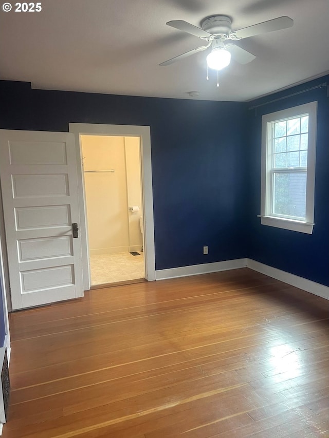 6433 NE 35th Ave, Portland, OR 97211 - unfurnished room featuring wood finished floors and ceiling fan