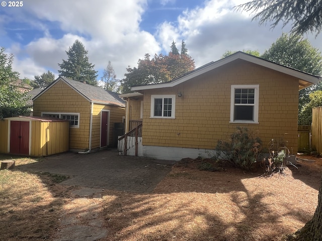 6433 NE 35th Ave, Portland, OR 97211 - view of property exterior featuring a storage unit