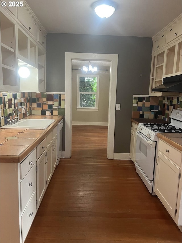 6433 NE 35th Ave, Portland, OR 97211 - kitchen with white appliances, open shelves, under cabinet range hood, and decorative backsplash