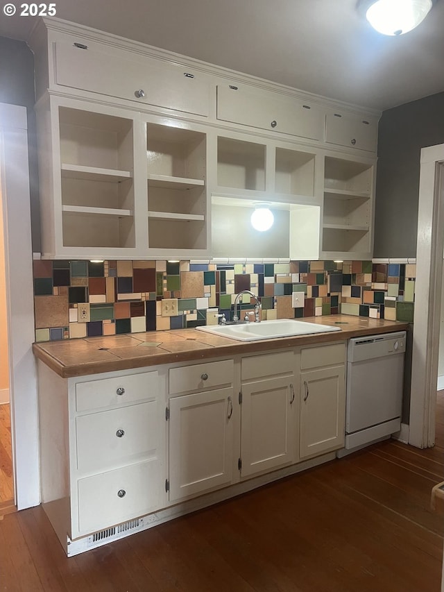 6433 NE 35th Ave, Portland, OR 97211 - kitchen with white dishwasher, open shelves, dark wood-style flooring, backsplash, and white cabinetry
