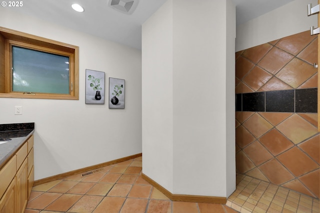 3758 Pine Canyon Dr, Eugene, OR 97405 - bathroom featuring vanity, baseboards, recessed lighting, and tile patterned floors