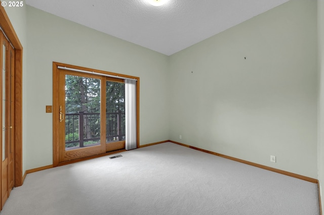 3758 Pine Canyon Dr, Eugene, OR 97405 - spare room with baseboards, carpet floors, and a textured ceiling