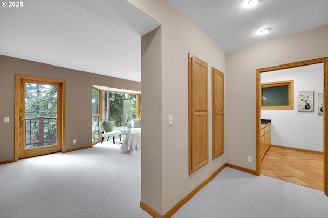 3758 Pine Canyon Dr, Eugene, OR 97405 - corridor with baseboards and light colored carpet