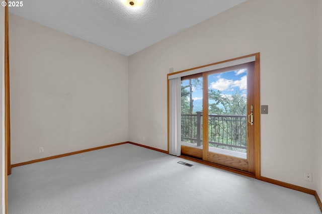 3758 Pine Canyon Dr, Eugene, OR 97405 - carpeted spare room with baseboards and a textured ceiling