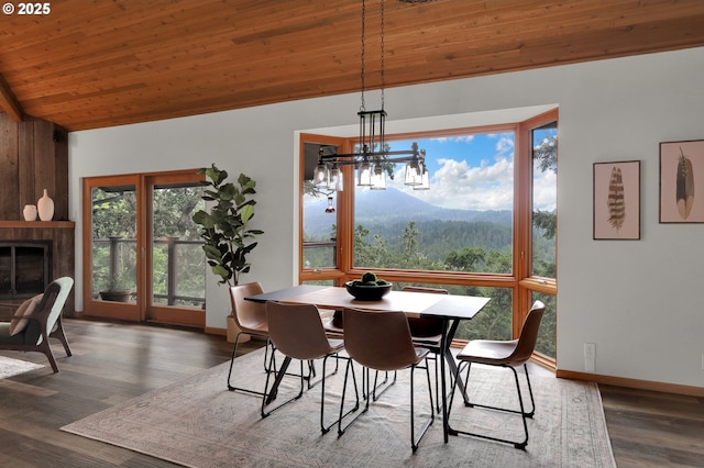 3758 Pine Canyon Dr, Eugene, OR 97405 - dining room featuring vaulted ceiling, healthy amount of natural light, wood finished floors, baseboards, and wooden ceiling