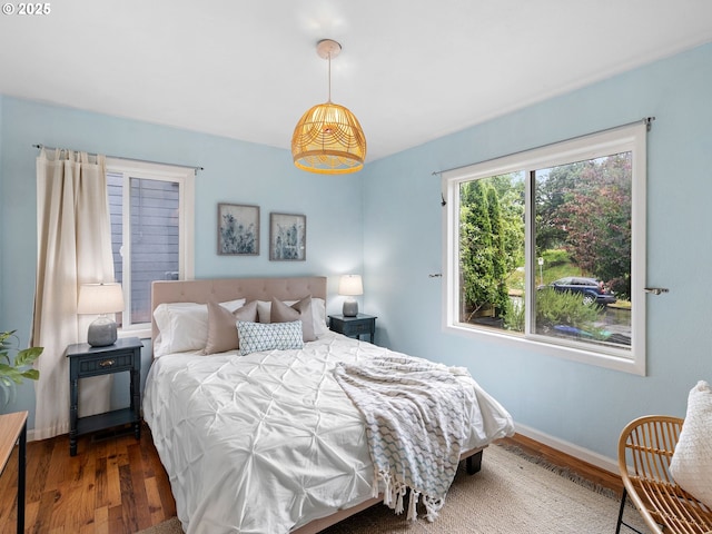 3516 N Missouri Ave, Portland, OR 97227 - bedroom featuring wood finished floors and baseboards