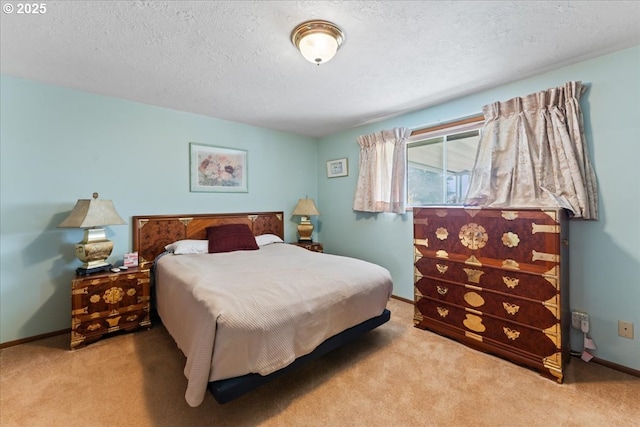 2242 W Hayes St, Woodburn, OR 97071 - carpeted bedroom with baseboards and a textured ceiling