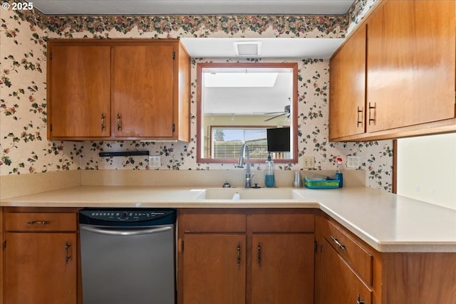 2242 W Hayes St, Woodburn, OR 97071 - kitchen featuring light countertops, dishwasher, brown cabinetry, and a sink