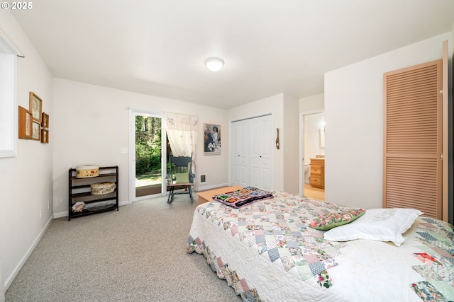 bedroom with baseboards, access to outside, two closets, and light colored carpet