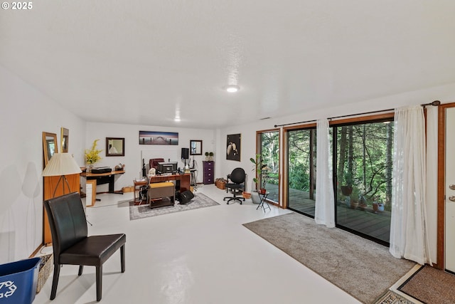 home office with finished concrete flooring