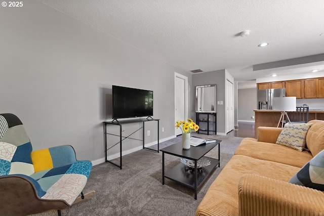11595 SW Fairview Ln, Tigard, OR 97223 - carpeted living room with baseboards, a textured ceiling, and recessed lighting