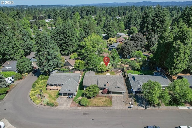 11595 SW Fairview Ln, Tigard, OR 97223 - aerial view of property's location featuring a heavily wooded area and nearby suburban area