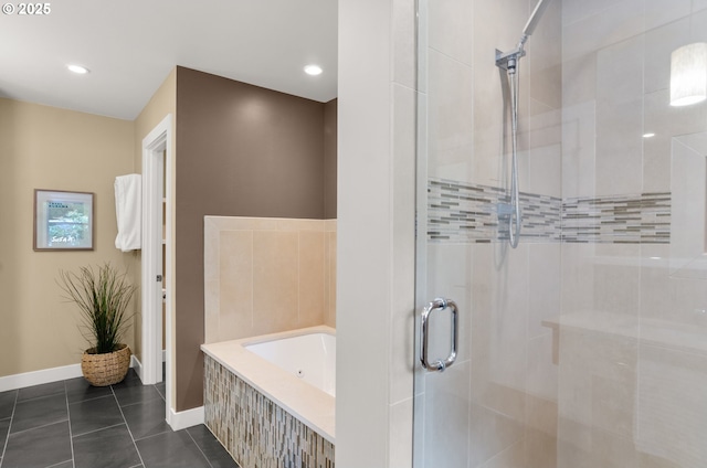 3132 SW Altadena Ter, Portland, OR 97239 - full bath featuring a stall shower, a jetted tub, tile patterned flooring, and baseboards
