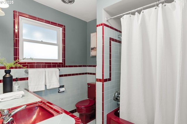 3132 SW Altadena Ter, Portland, OR 97239 - bathroom with shower / tub combo with curtain, toilet, tile walls, and vanity