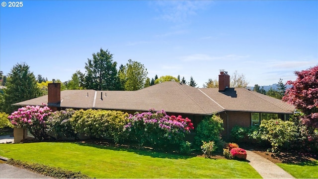 3132 SW Altadena Ter, Portland, OR 97239 - single story home with a front yard and a chimney