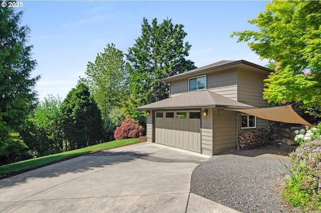 3132 SW Altadena Ter, Portland, OR 97239 - view of front of property with concrete driveway and a shingled roof