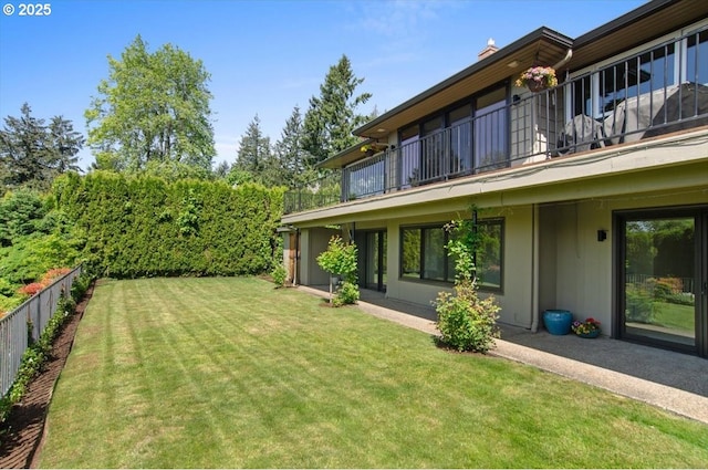 3132 SW Altadena Ter, Portland, OR 97239 - view of grassy yard with a balcony