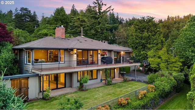 3132 SW Altadena Ter, Portland, OR 97239 - back of house featuring a chimney and a shingled roof