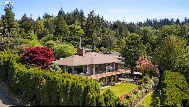 3132 SW Altadena Ter, Portland, OR 97239 - aerial view of property and surrounding area with a forest