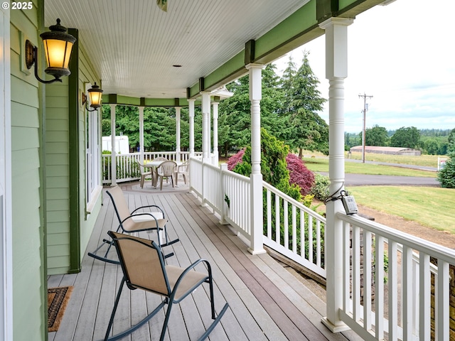 wooden terrace with covered porch