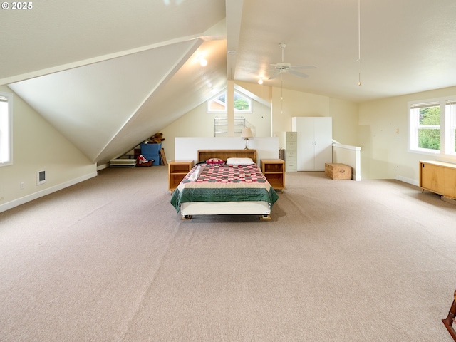 carpeted bedroom featuring ceiling fan and lofted ceiling